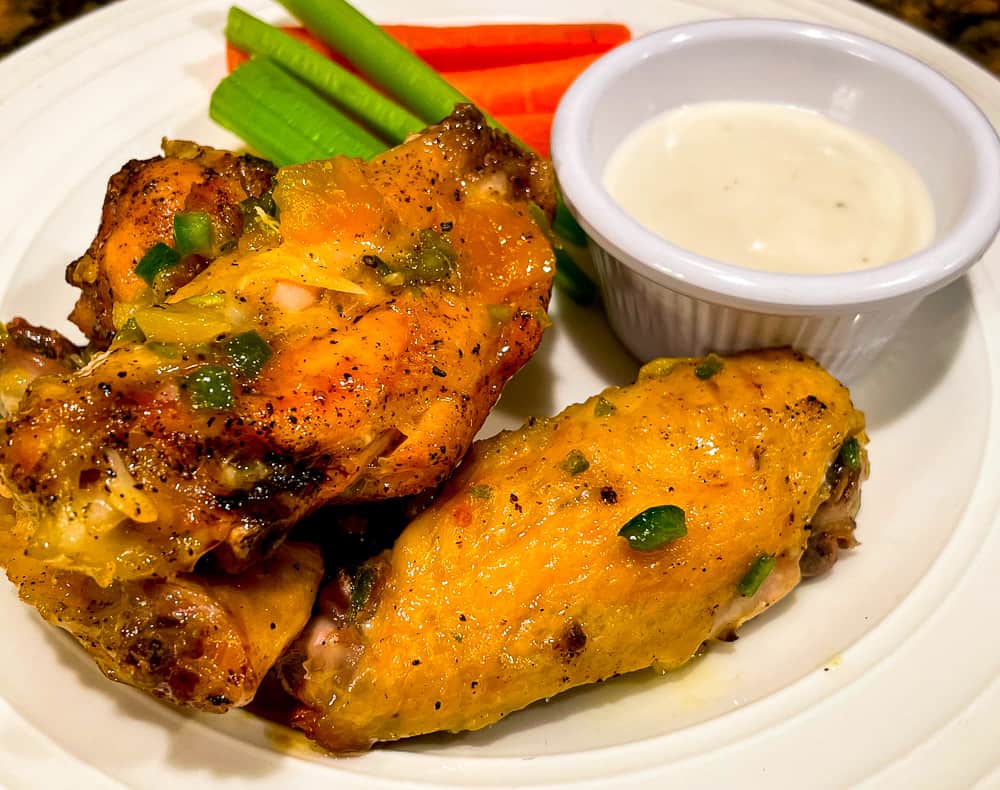 Mango jalapeno wings with carrots, celery, and bleu cheese.