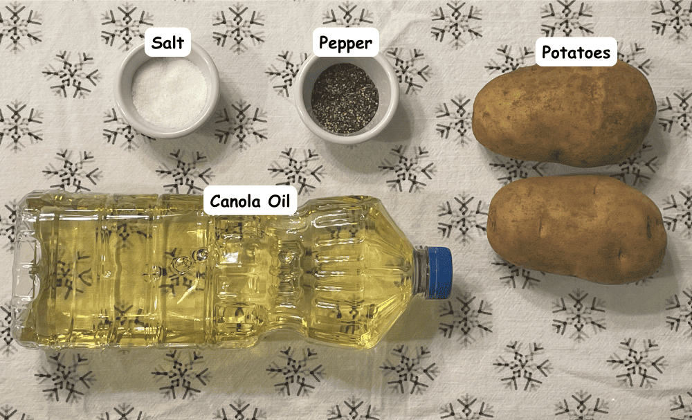 Homemade potato chip ingredients. Canola oil, sea salt, pepper, potatoes.