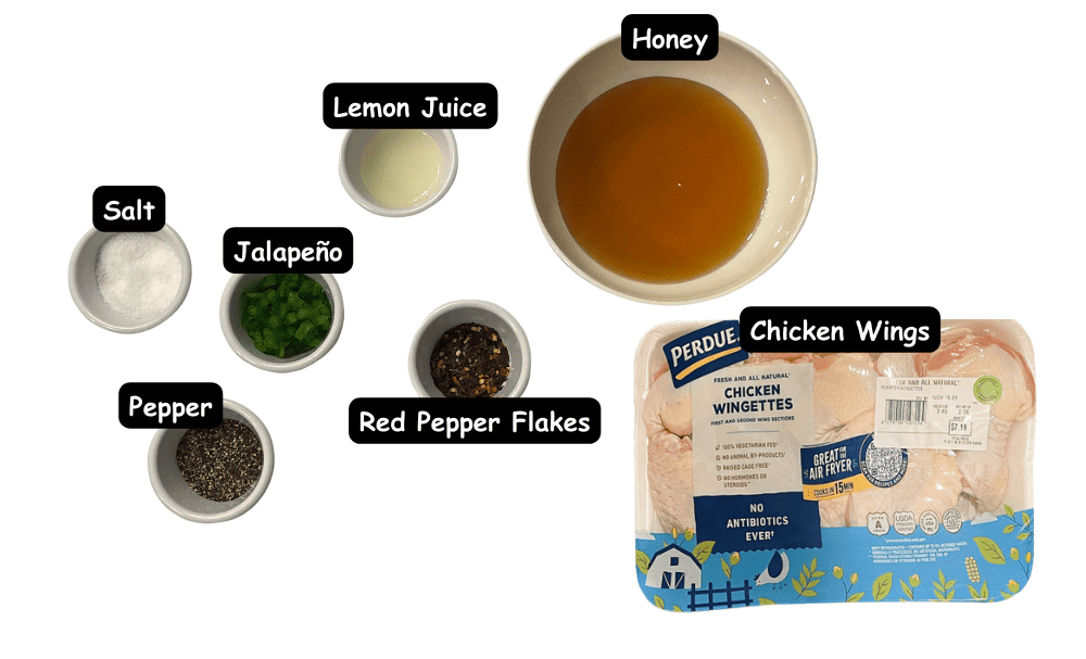 Hot pepper honey chicken wing ingredients. Chicken wings, honey, lemon juice, red pepper flakes, jalapeño, salt, pepper.